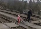 Man filmed crossing in front of a train with child, police seek ID