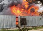 Two firefighters injured in large fire at industrial site west of Prague