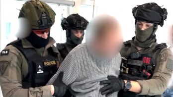 Suspect arrested at Prague airport over online threats of mass violence